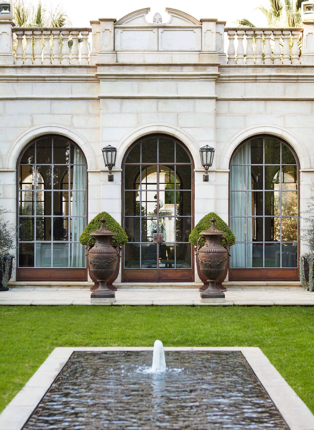 The Chateau hallway with heritage detailing by Hare + Klein