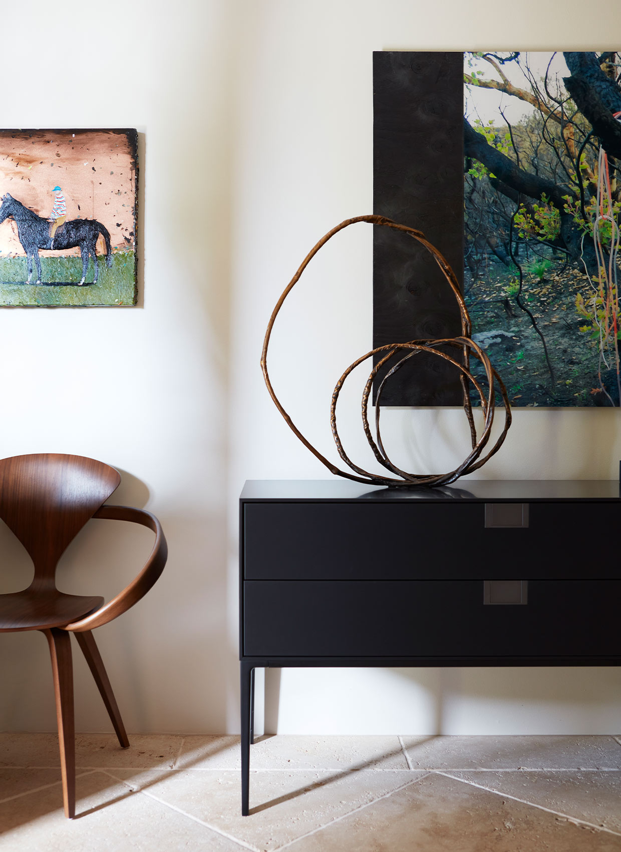 The Chateau study with eclectic art and antiques by Hare + Klein