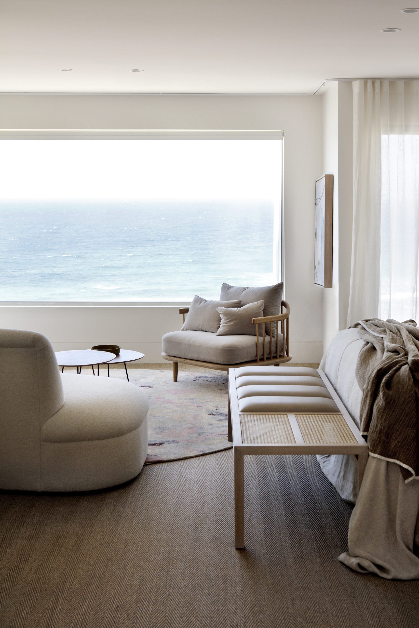 Ocean Front guest bedroom with relaxed coastal furnishings by Hare + Klein Newcastle