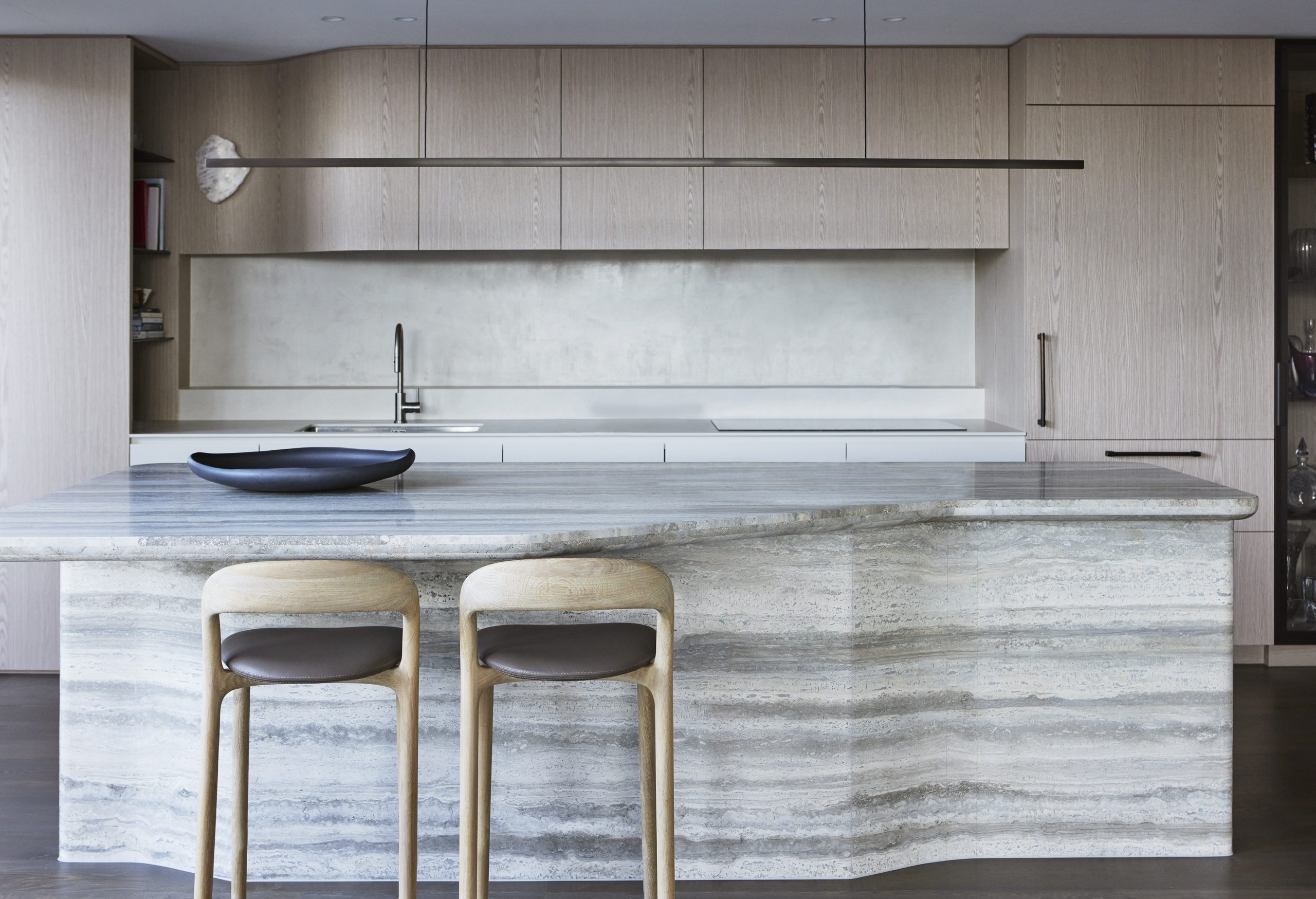 Skyline Penthouse living room with contemporary furnishings by Hare + Klein