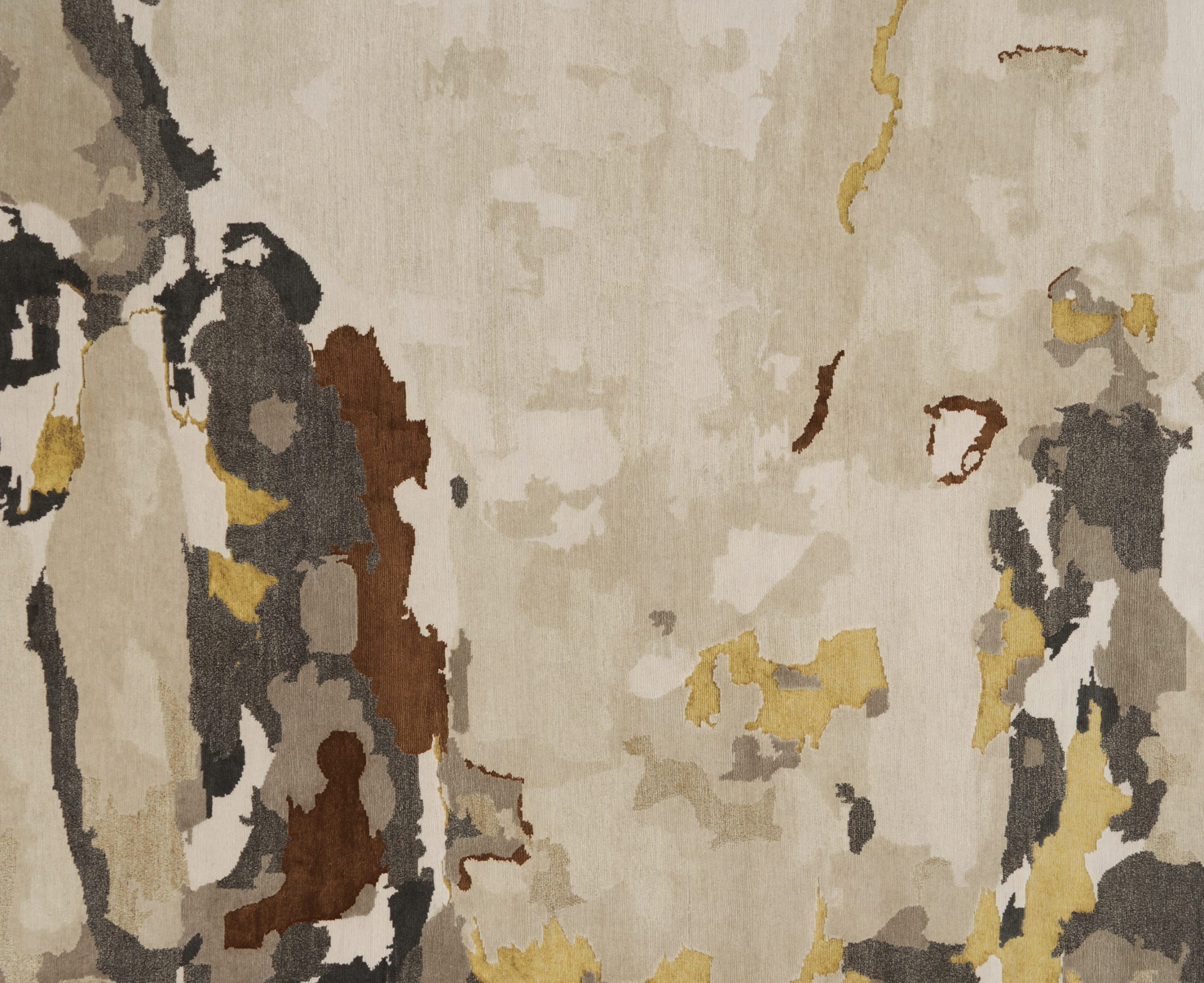 Close-up of Favo rug's honeycomb-inspired gold and brown pattern, design by Cristina Repeti