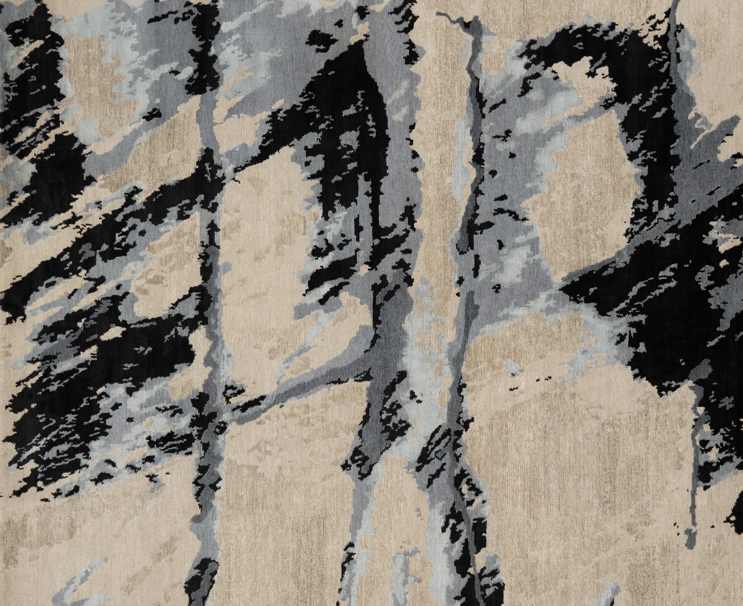 Close-up of Shores rug's black and grey linear pattern, design by Meryl Hare inspired by coastal inlets